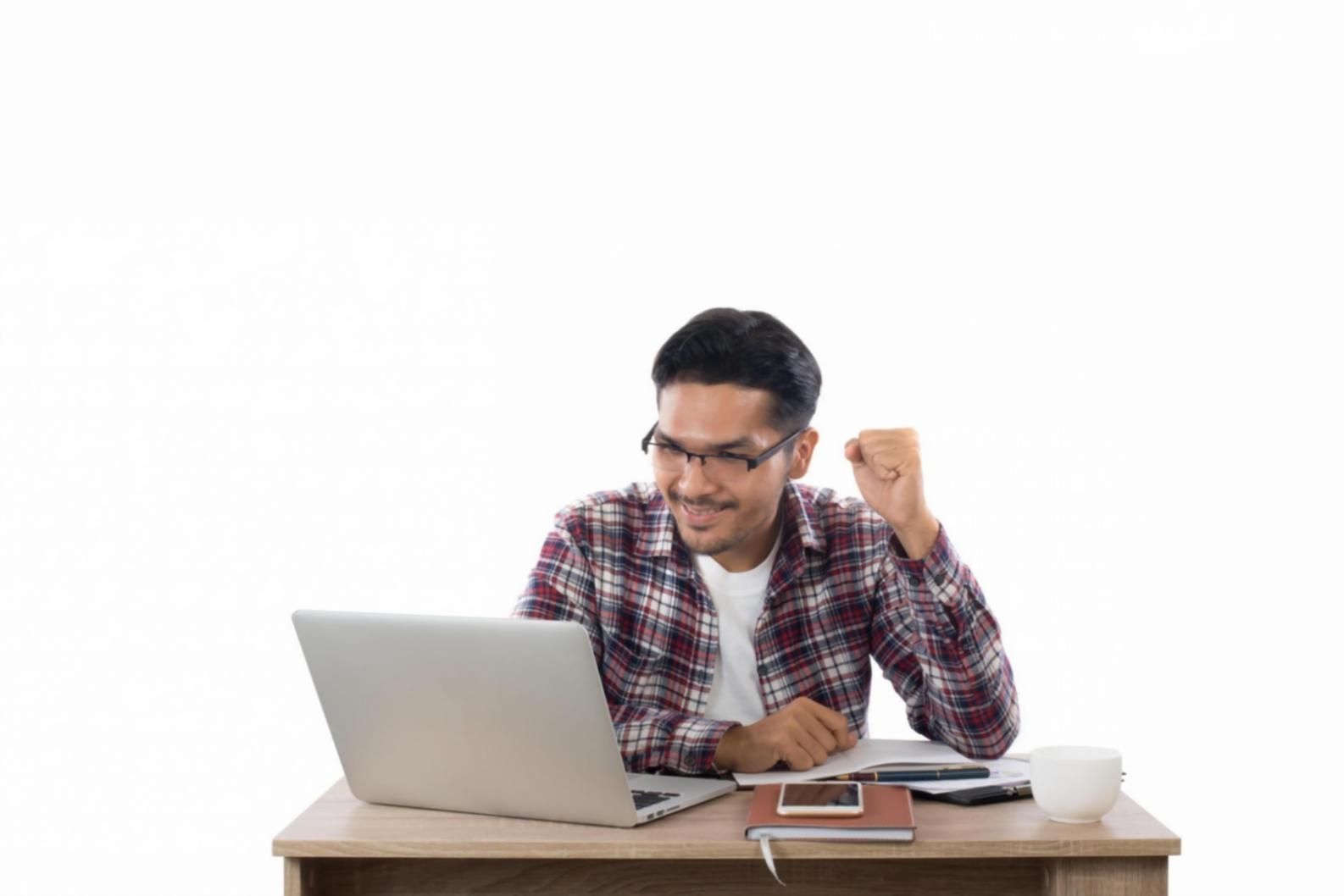 QA testing professional working on test case development in modern office environment